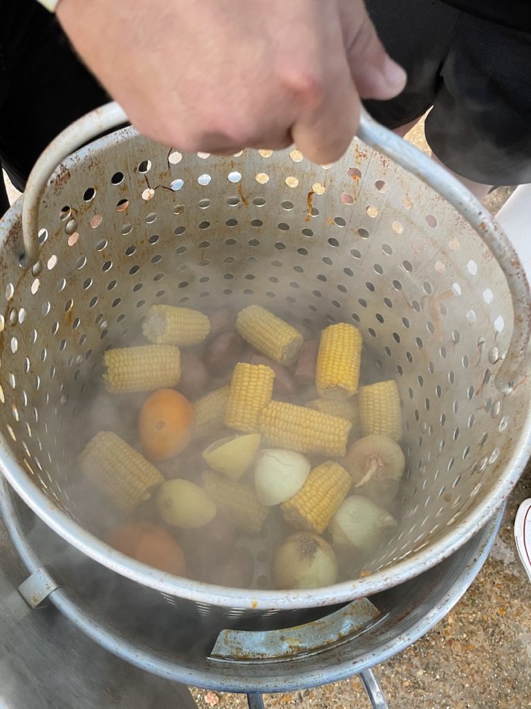 ready for the crawfish to be added, basket with veggies