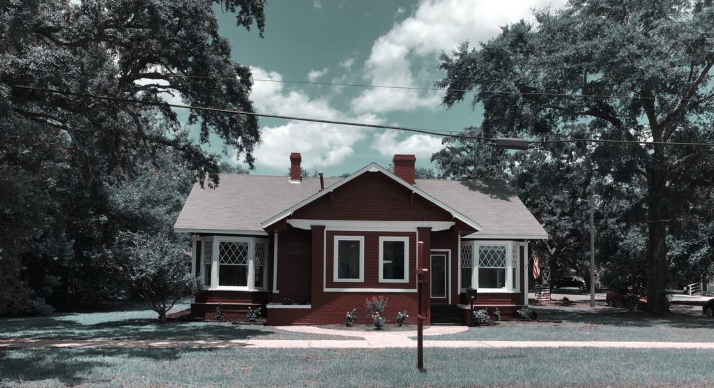 Example of old house remodeled into an office Logan-Anderson Gulf Coastal Realtors