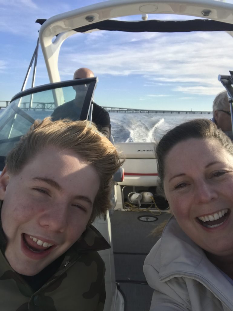 people having fun on a boat an alternative to moving to Florida