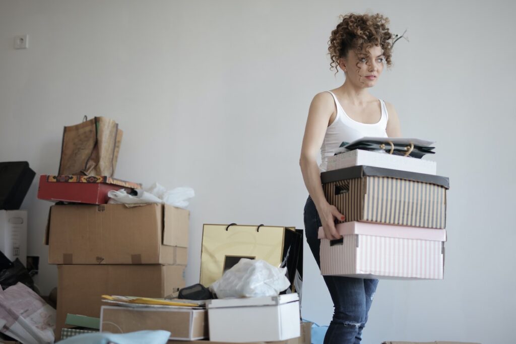 woman packing to move stuff