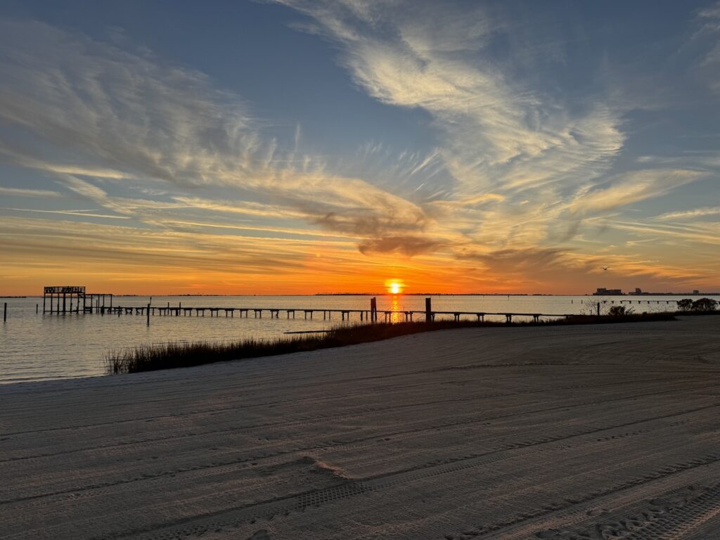 Beach and pier at sunset Mississippi Gulf Coast