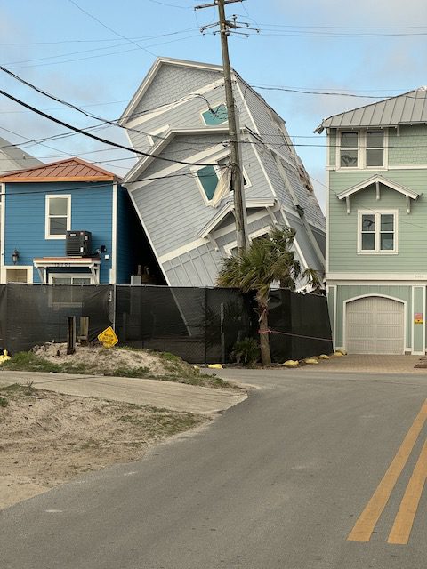house damaged by hurricane