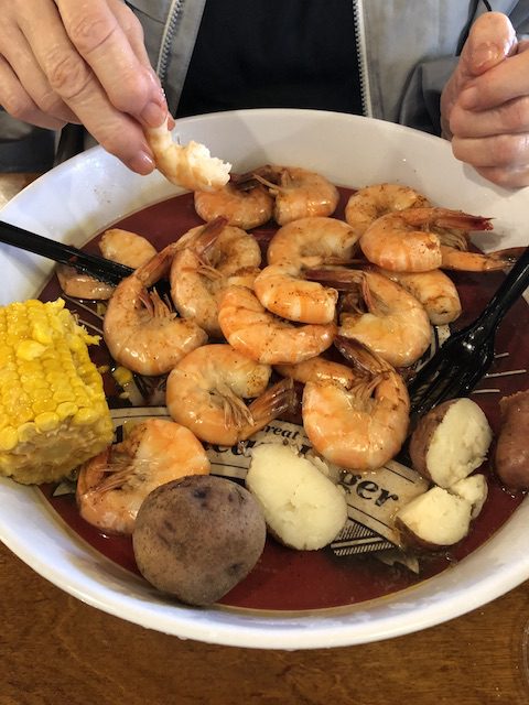 shrimp boil bowl with shrimp, potatoes, corn and sausage